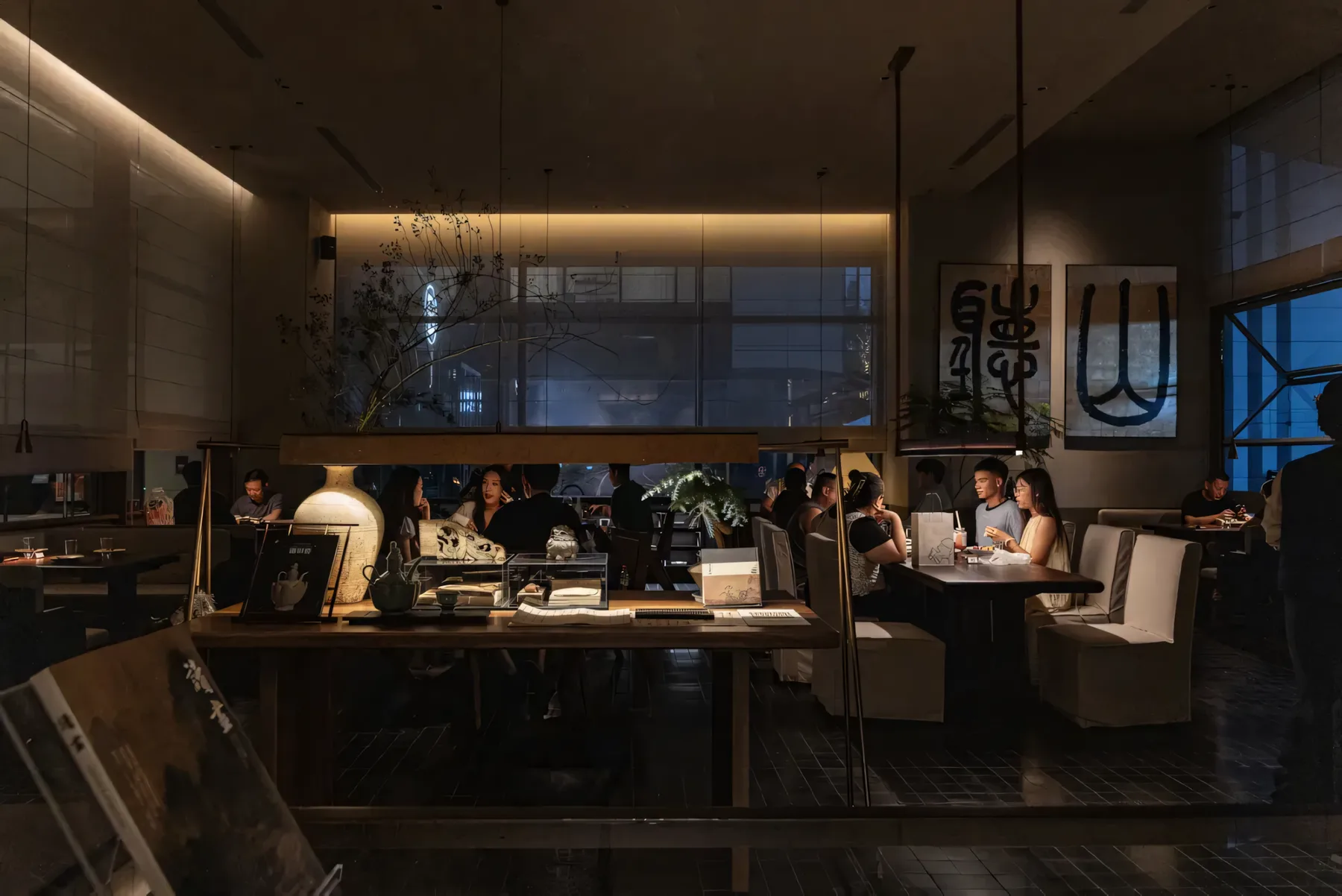 Tingshan restaurant interior with warm light and natural material atmosphere